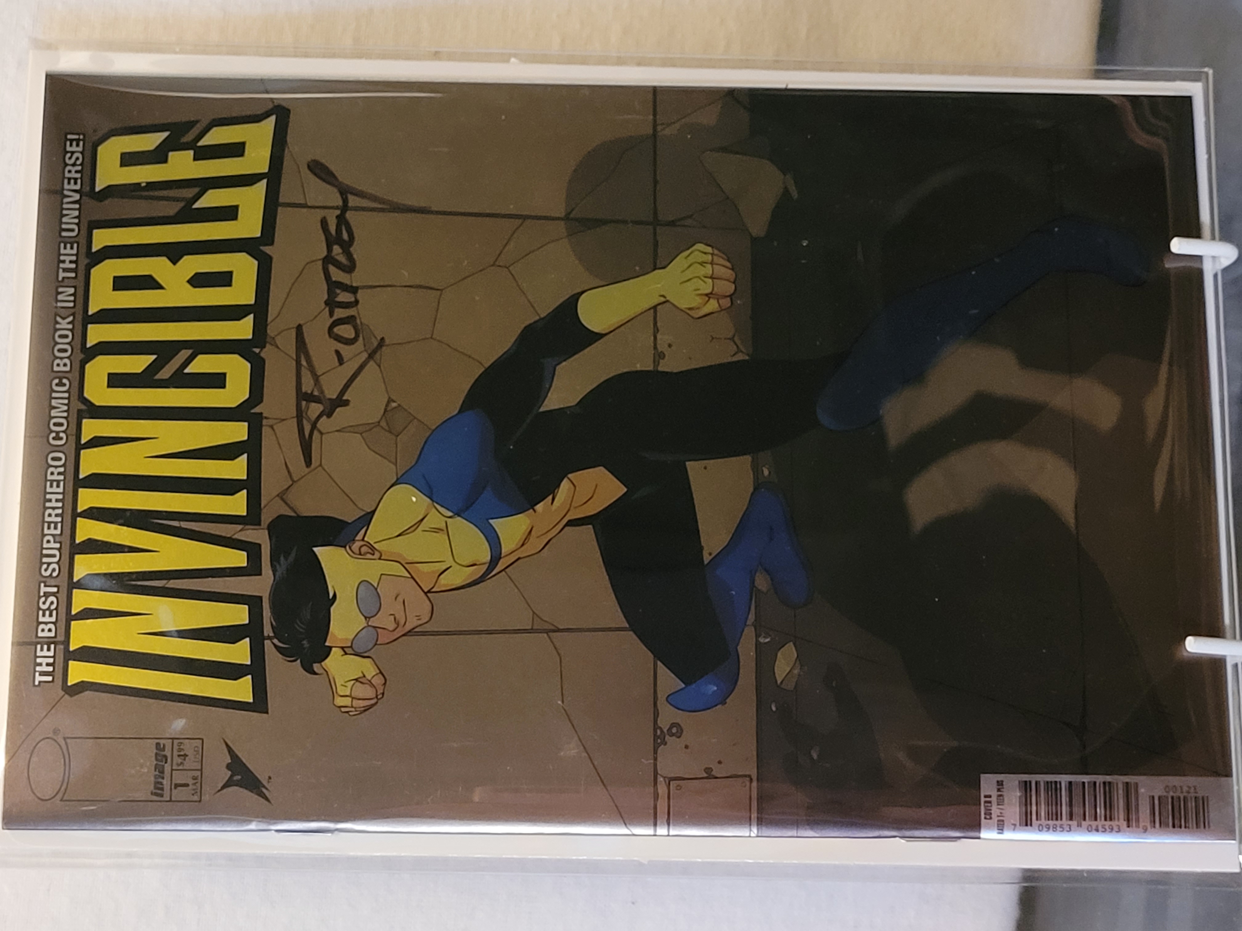 invincible #1 foil reprint signed by Ryan Ottley w/coa